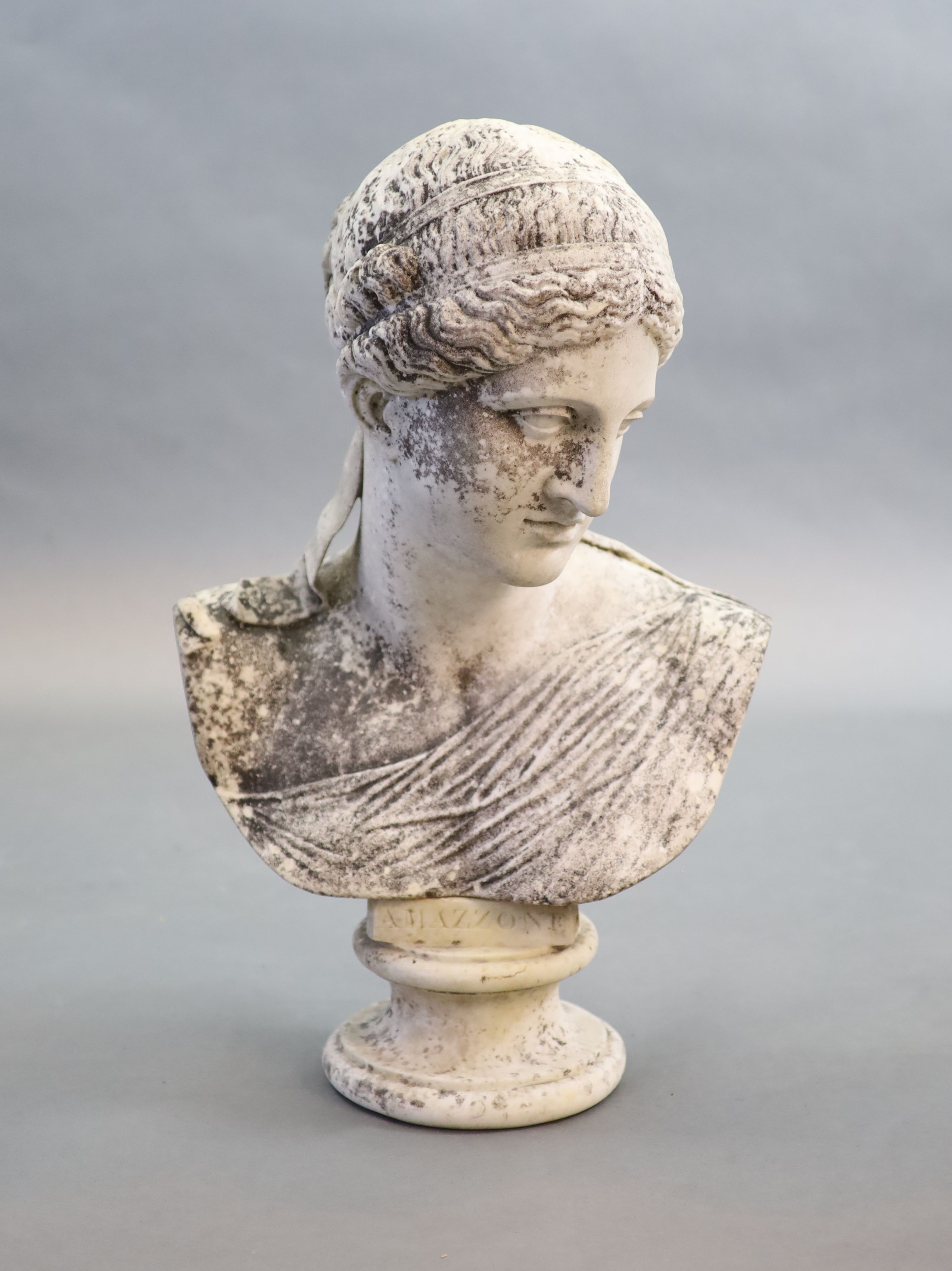 A large weathered white marble bust of a Grecian maiden, 19th century 52cm high (68cm combined, maximum)